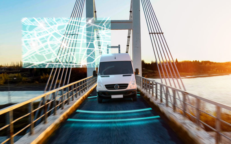 Autonomous transporter Car driving on a bridge highway with technology assistant tracking information, showing details. Visual effects concept